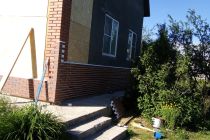 Из деревенского дома в презентабельный кирпичный коттедж